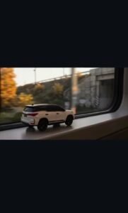 Toy Car To Real Car Transition Prompt